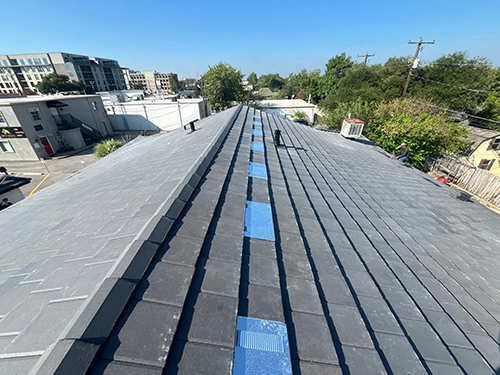 Precision Roof Crafters After Tile Roof Replacement Job For Commercial Property Completed In Austin Texas